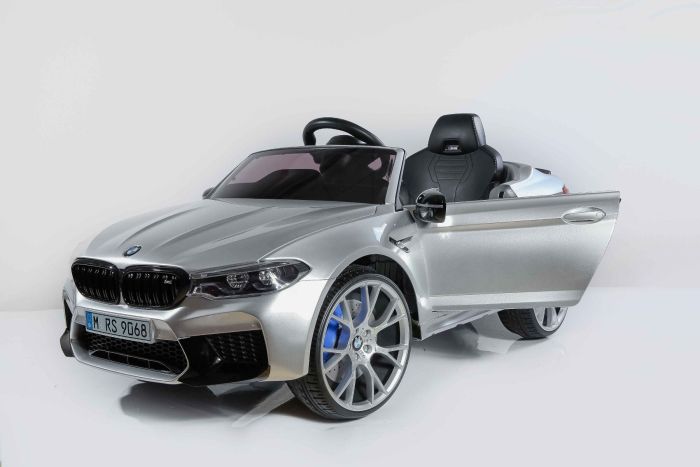 Electric Ride on Car BMW M5 Lacquered metallic Original Licenced 24V Battery Powered opening doors 2x 24V Engine 2.4 Ghz remote control Soft EVA wheels LED Lights Soft start MP3 player