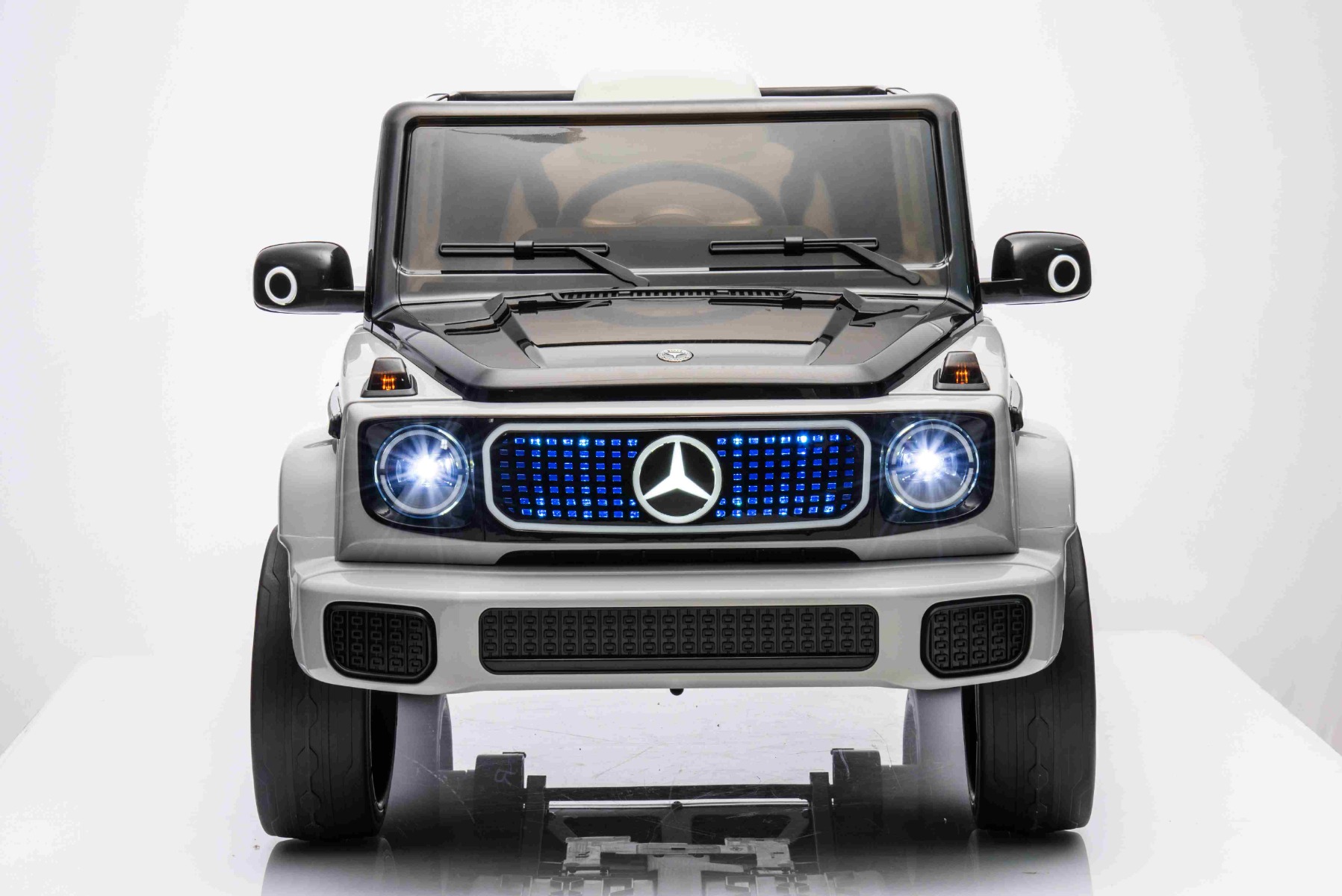 LED backlighting of the front grille, mirrors and turn signals