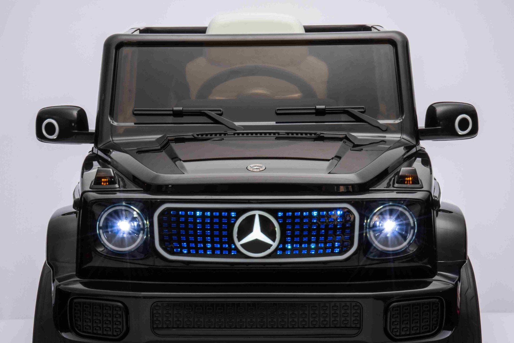 LED backlighting of the front grille, mirrors and turn signals